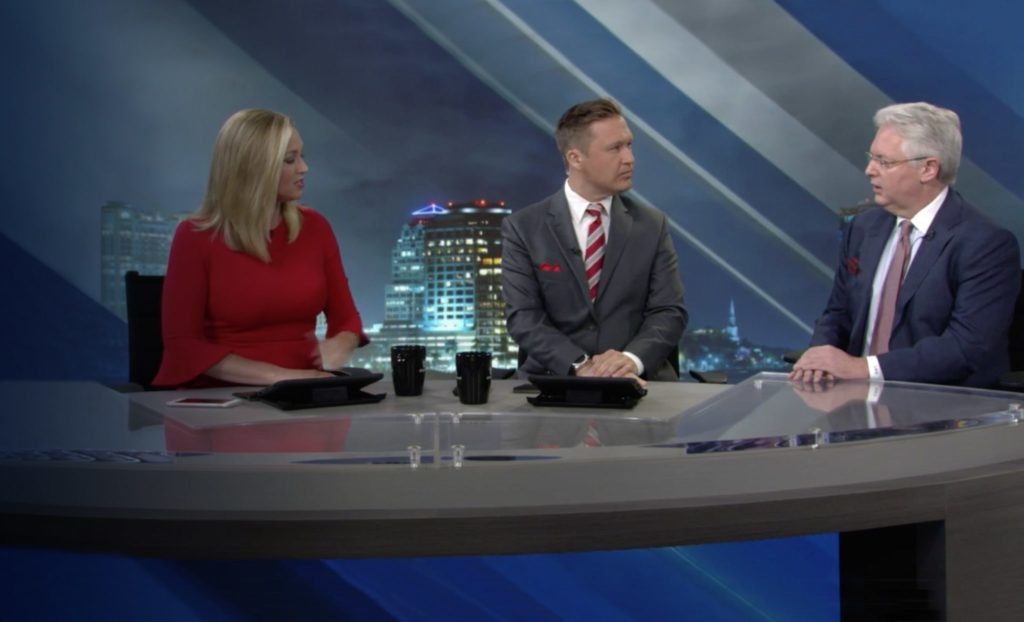 news anchors sitting 